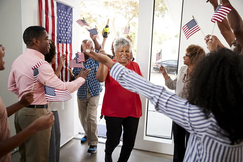 grandparents-arriving-at-a-three-generation-black-2024-10-19-15-48-58-utc